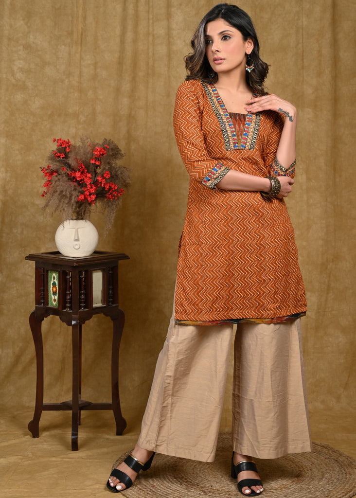 Exclusive Cotton Ajrakh Printed Tunic with madhubani Handpainted Lace on Sleeves and Neckline