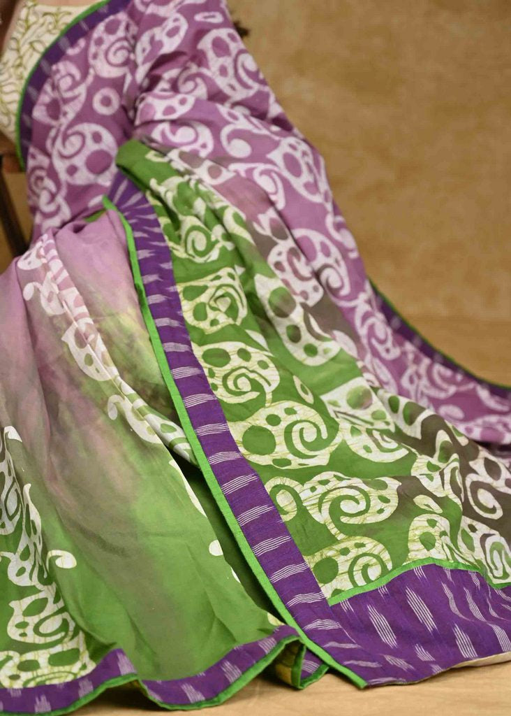 Exquisite Mul Cotton Battik Saree with Purple Ikaat Border