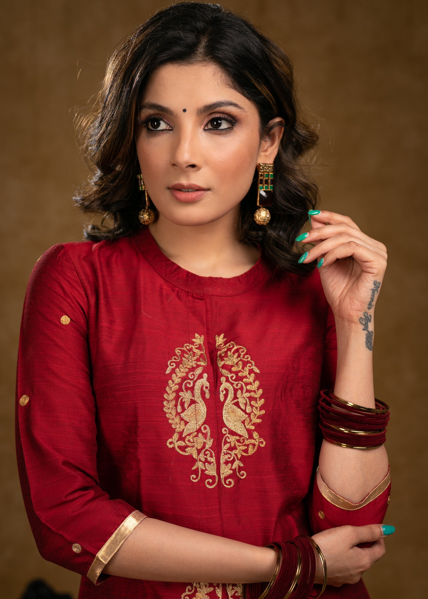 Elegant Maroon Cotton Silk Kurta with Peacock Embroidered Motifs in Front