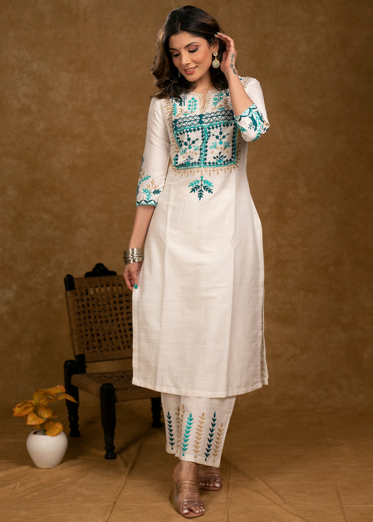 Graceful Off-White Cotton Silk Kurta & Pant Set with Intricately Embroidered Yoke