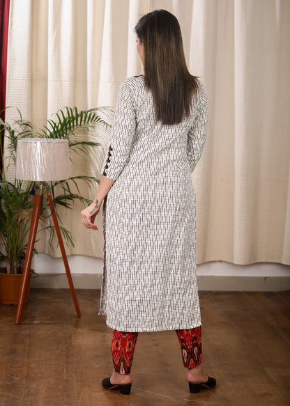 Graceful Straight Cut Ikat Kurta with Hand Embroidered Mirror Work On the Yoke and Beaded Sleeves