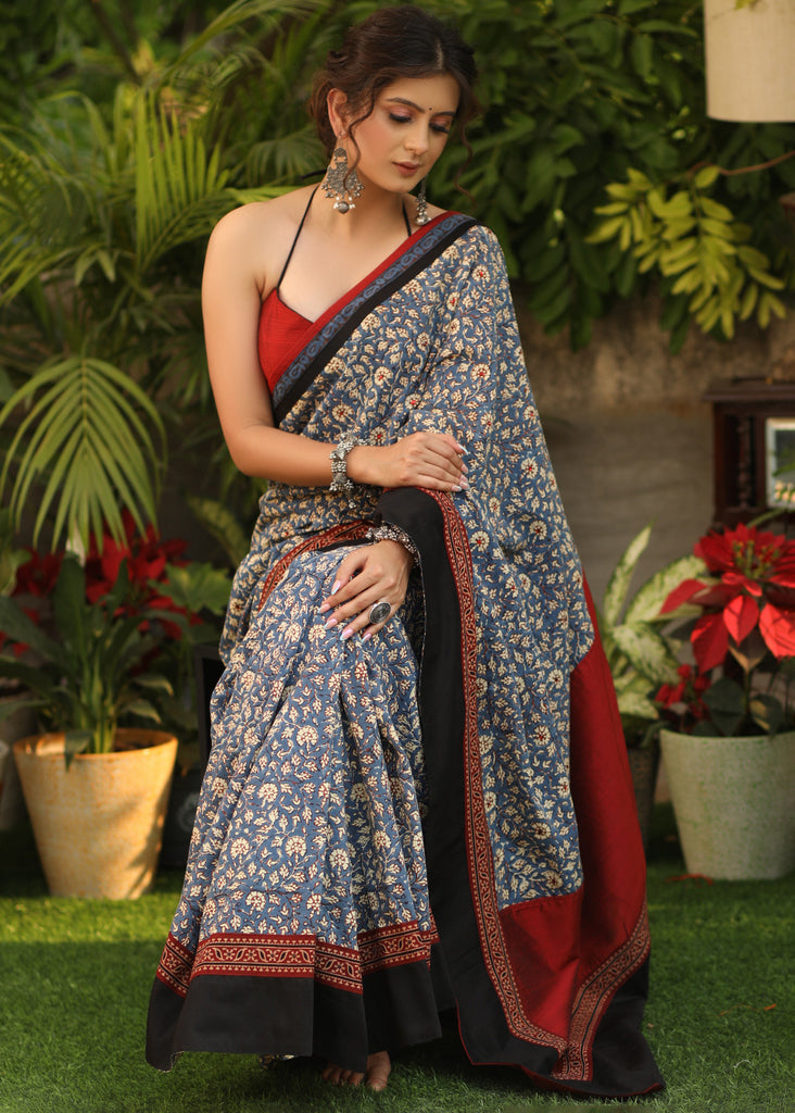 Spring bloom blue printed saree with Ajrakh and Cotton silk combination border with red stone Embellishment