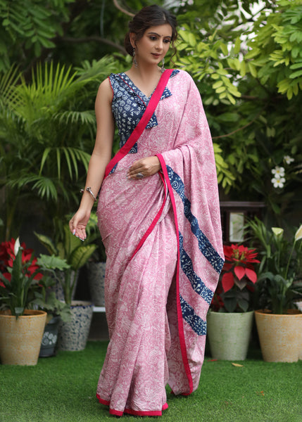 Stylish powder pink printed saree with Rani pink & Indigo border