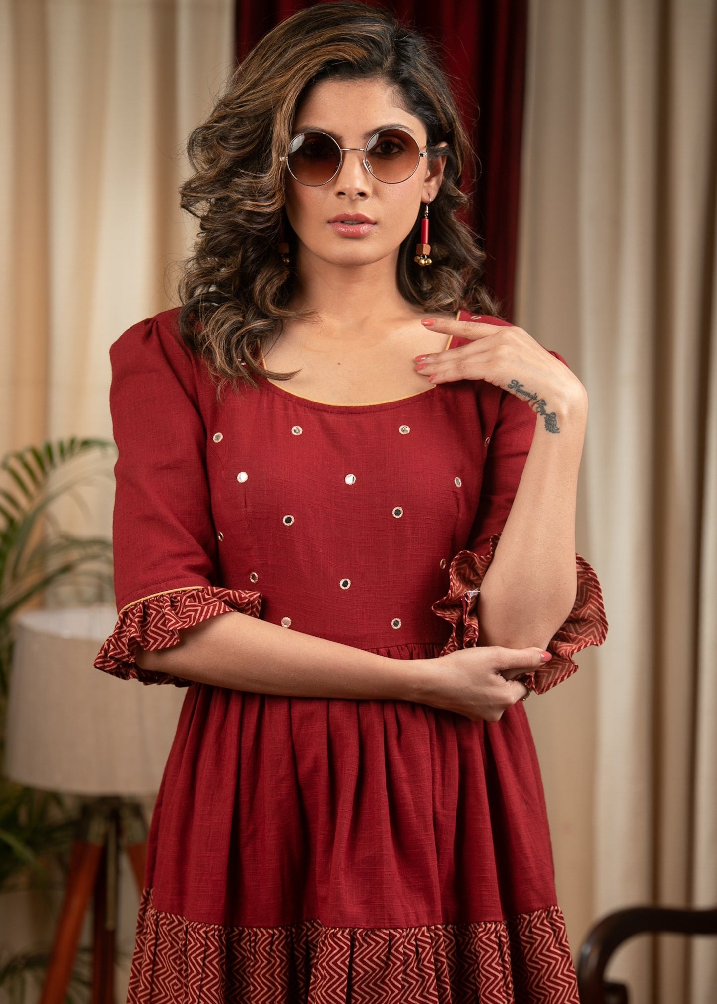 Rust cotton tiered dress with mirror work