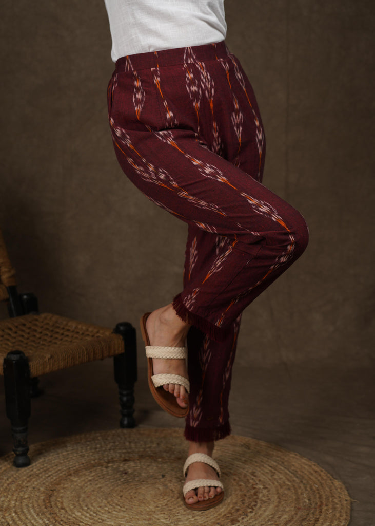 Elegant maroon ikat narrow fitted trouser with fringes on the hemline