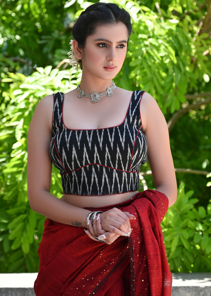 Smart Black Ikat Sleeveless Blouse with Red Detailing