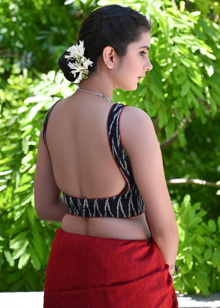 Smart Black Ikat Sleeveless Blouse with Red Detailing