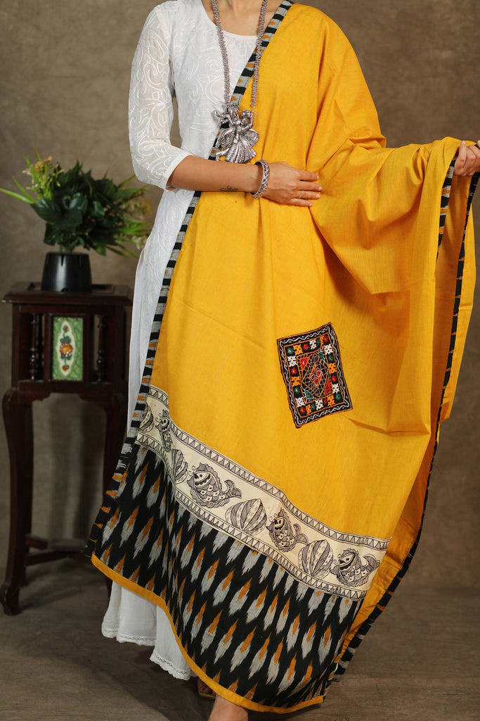 Elegant cotton mustard dupatta with exclusive hand painted Madhubani art and mirror work