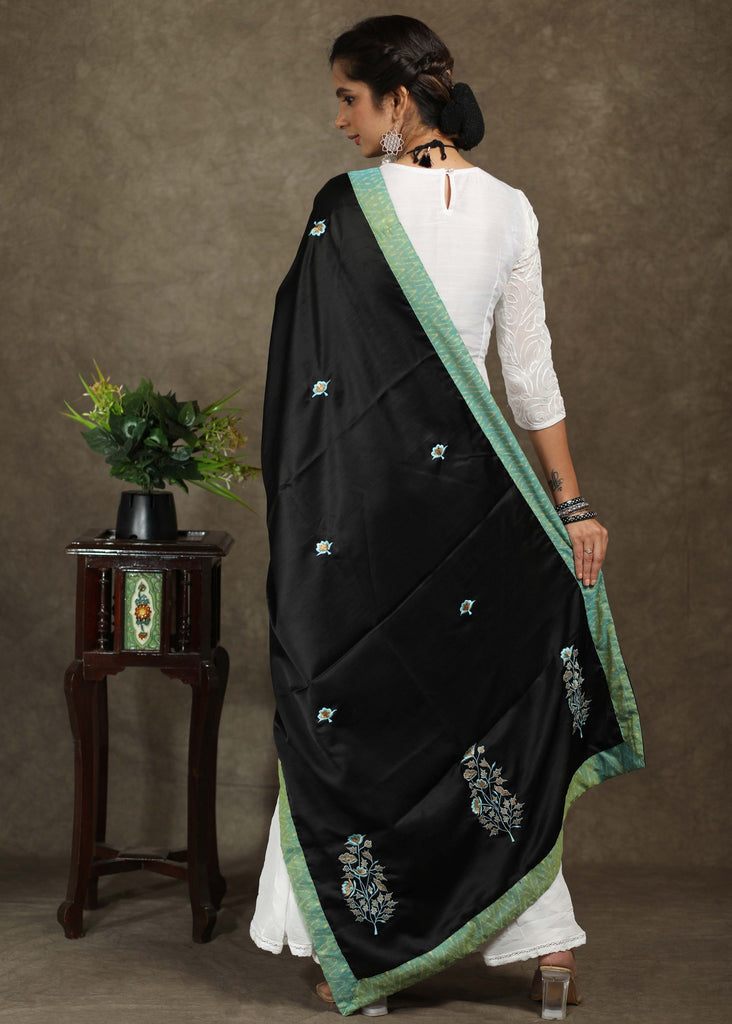 Beautiful black dupatta with elegant green embroidery and Ikkat border
