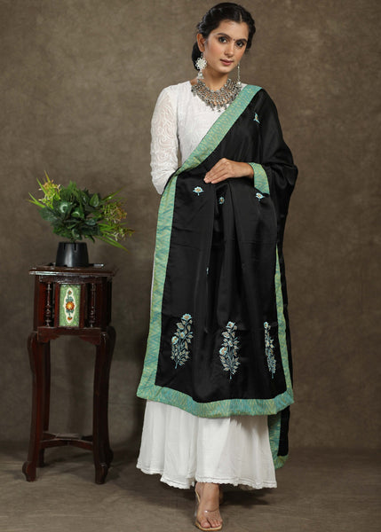 Beautiful black dupatta with elegant green embroidery and Ikkat border