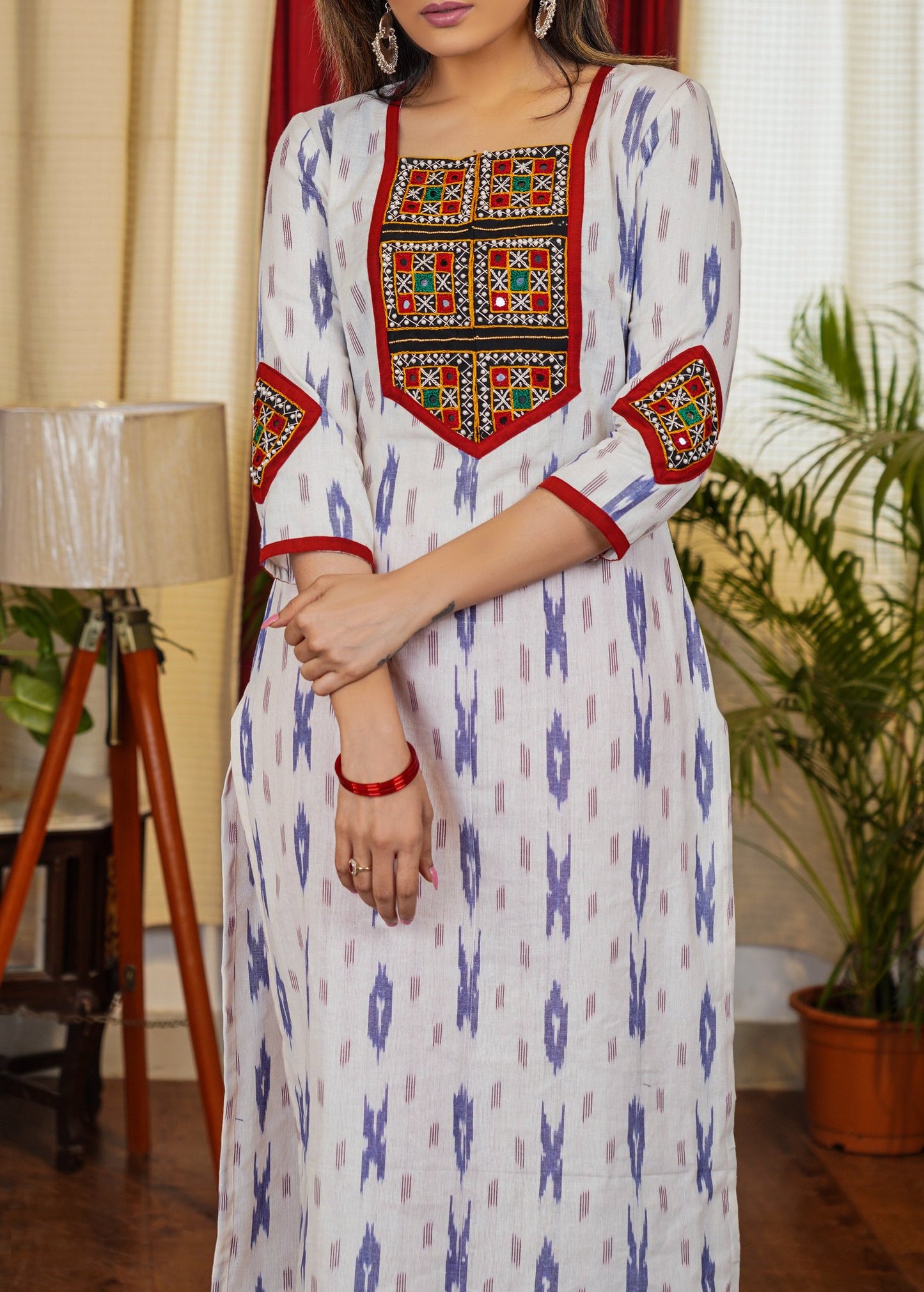 Graceful Ikat Cotton Straight Cut Kurta with Hand made Kutch Mirror work on Yoke and Sleeves