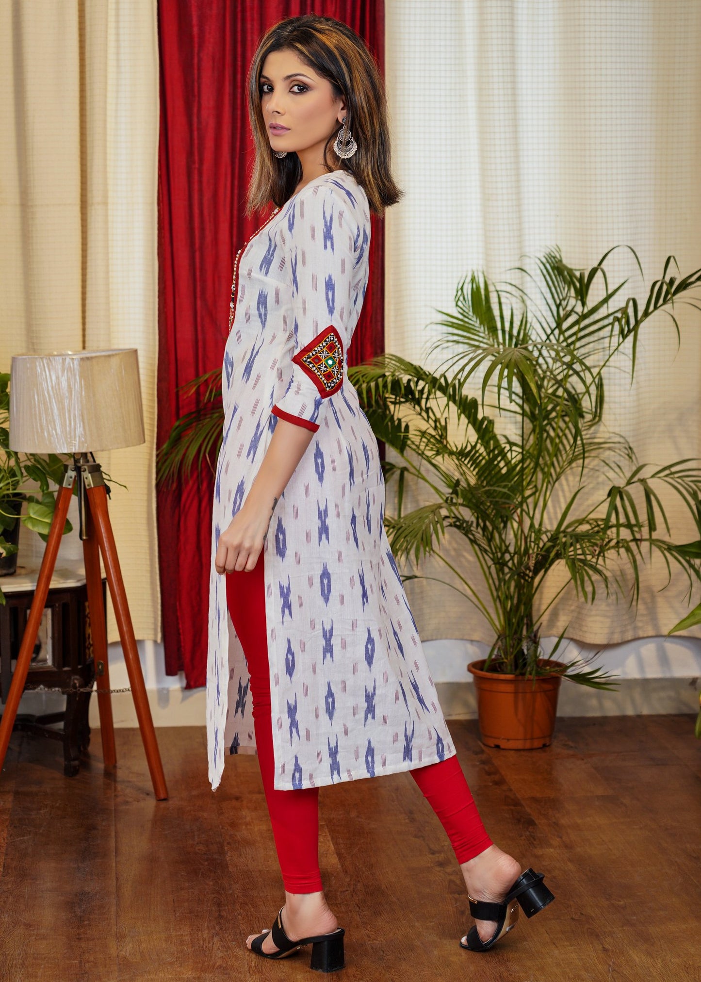 Graceful Ikat Cotton Straight Cut Kurta with Hand made Kutch Mirror work on Yoke and Sleeves