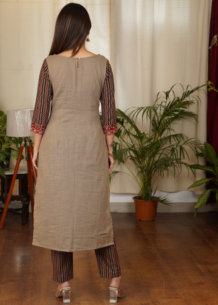 Simple and Elegant Straight cut Cotton Ajrakh Kurta with Beautiful Silver Coin Work Across