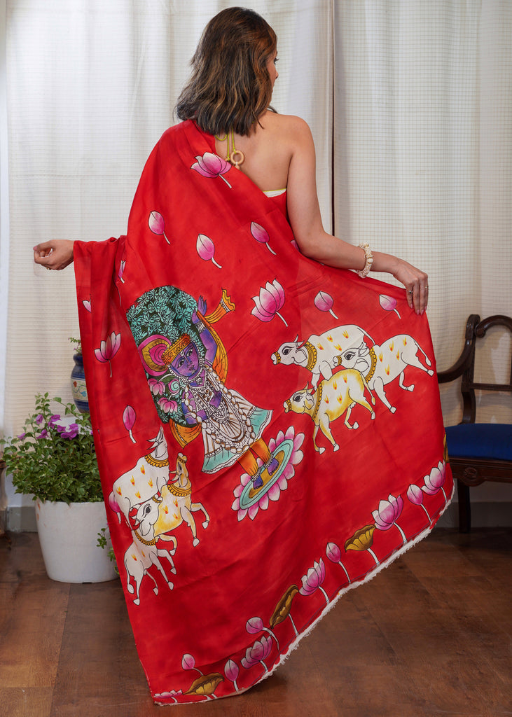 Pure silk hand painted red saree with elegant Krishna design