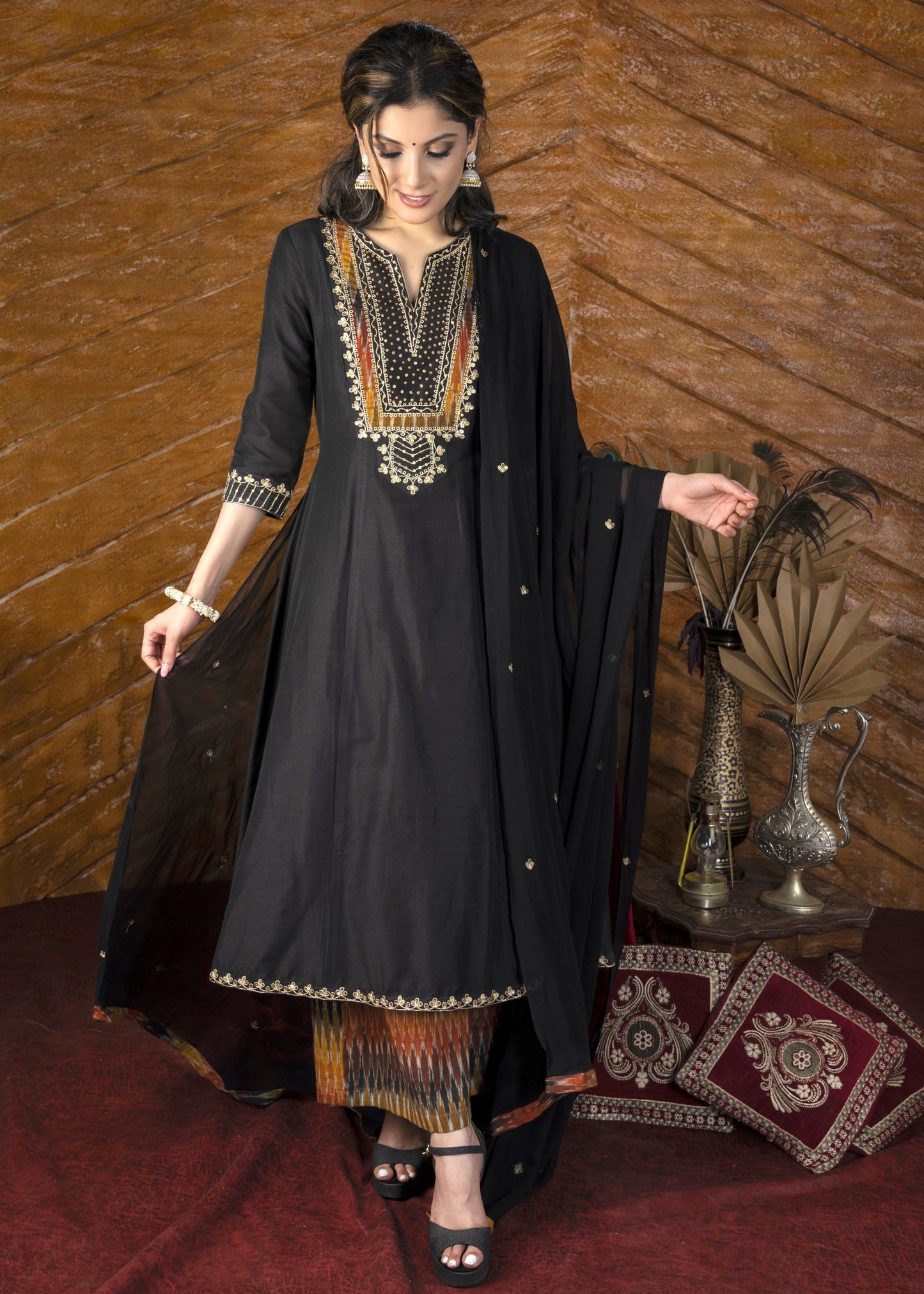 Plain black cotton silk kurta with heavy hand embroidered yoke