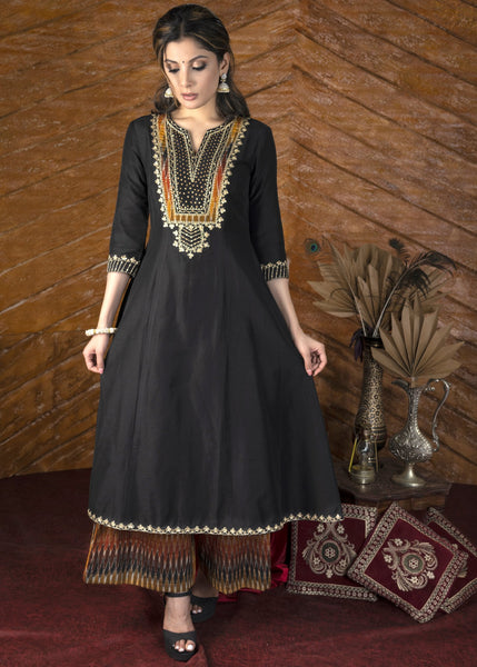 Plain black cotton silk kurta with heavy hand embroidered yoke & ikat palazzo pants - Dupatta optional.