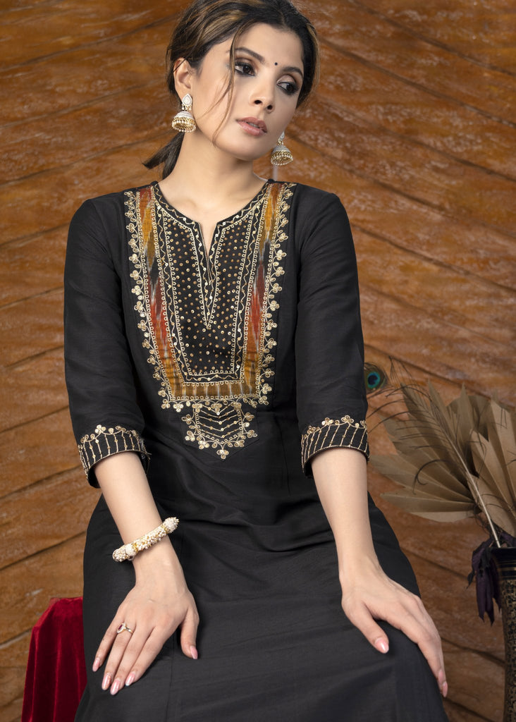 Plain black cotton silk kurta with heavy hand embroidered yoke & ikat palazzo pants - Dupatta optional.