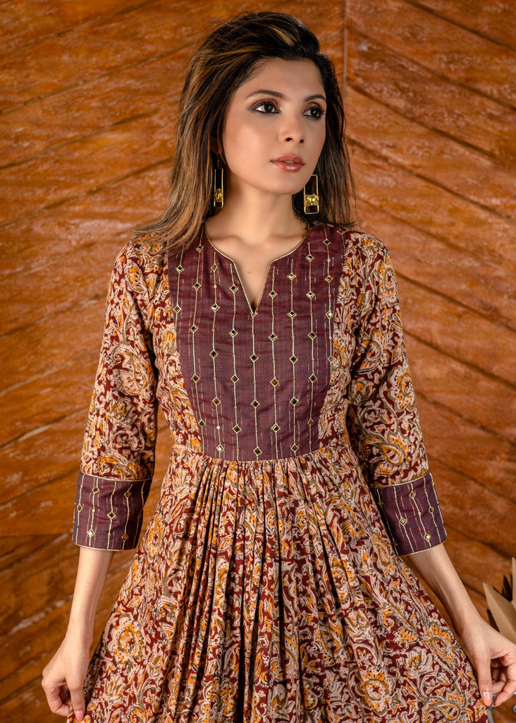 Exclusive Kalamkari short dress with hand embroidered yoke.