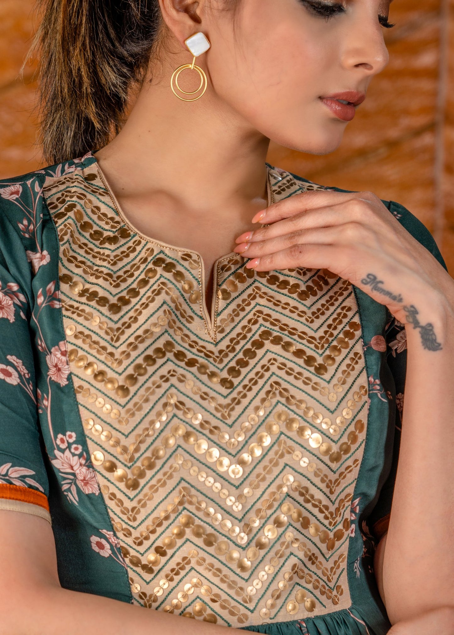 Exclusive printed floral satin dress with hand embroidered embroidered yoke.