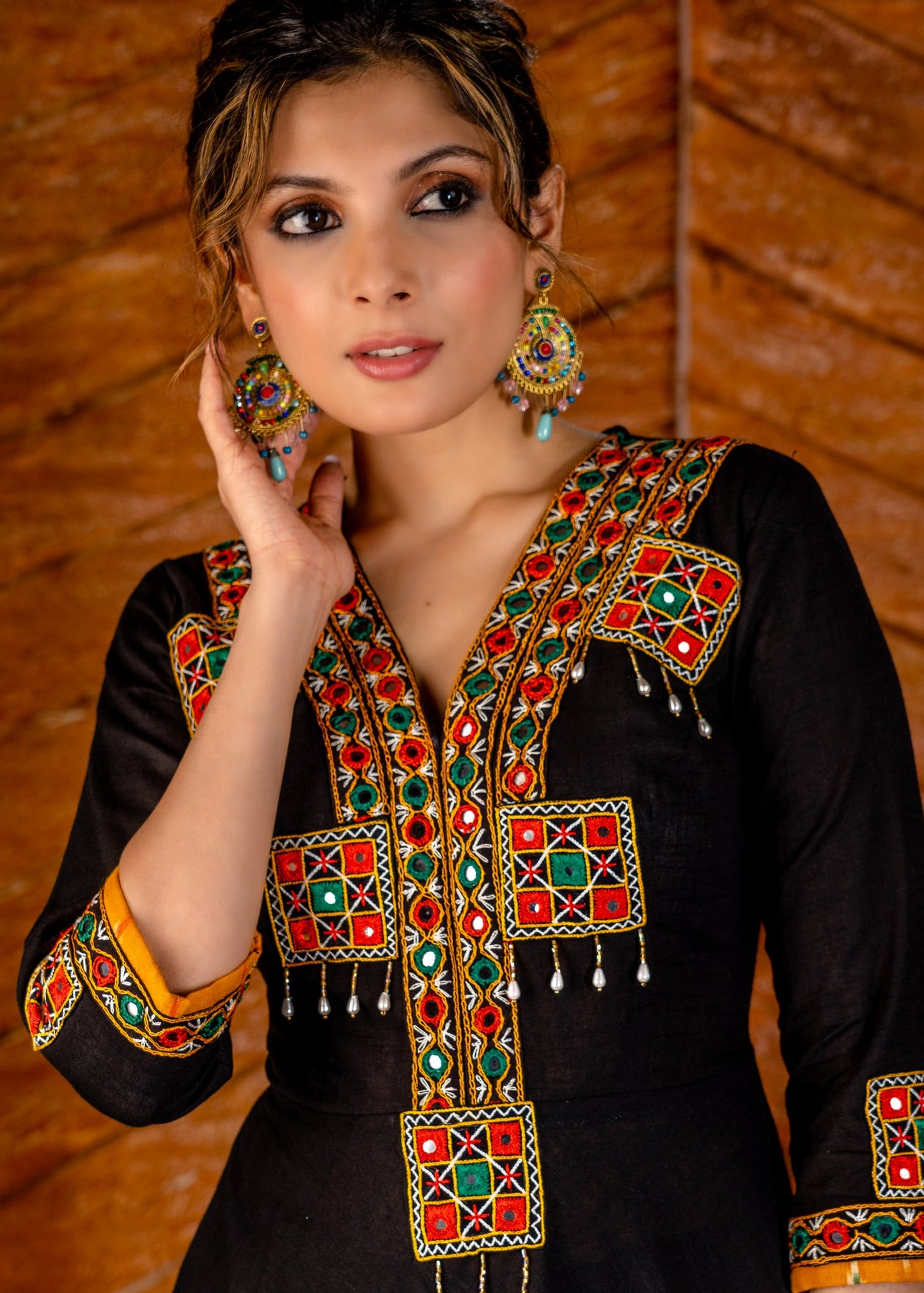 Exclusive black cotton gown with hand embroidered kutch mirror work yoke