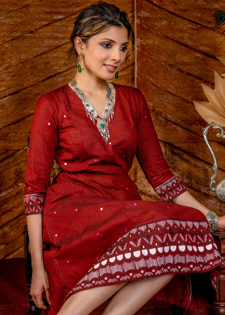 Exclusive hand painted maroon handloom cotton dress with overall mirrorwork embroidery.