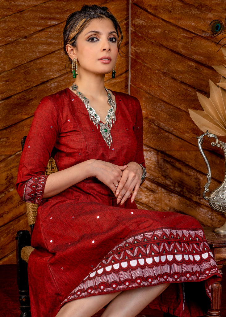 Exclusive hand painted maroon handloom cotton dress with overall mirrorwork embroidery.