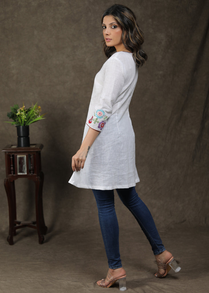 Classic White Cotton Pleated Tunic With Contrast Embroidery Work On Yoke And Sleeves
