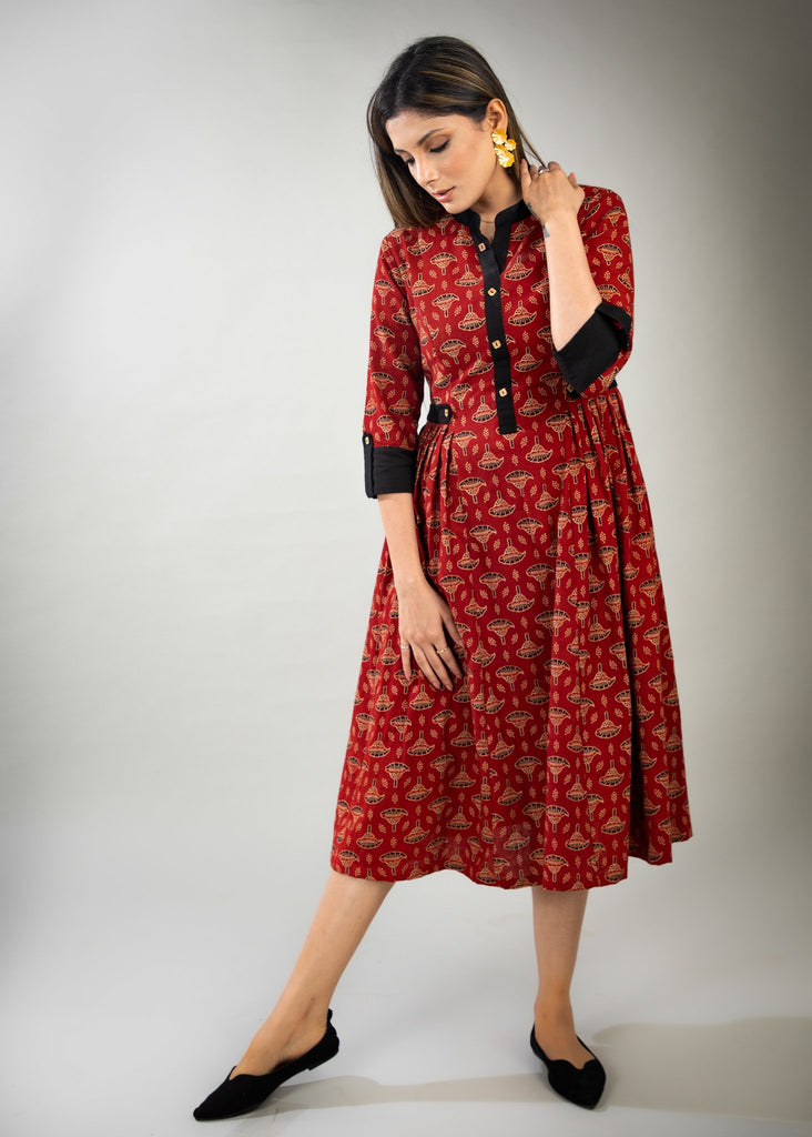 Rust floral Ajrakh dress with pleats on waist