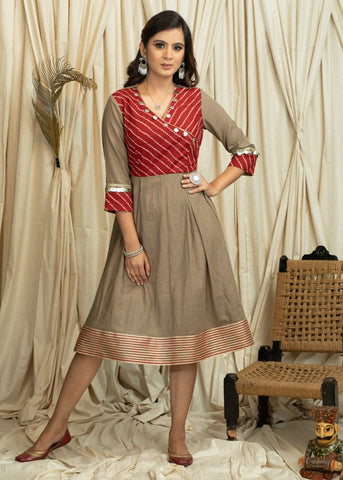 Exclusive beige dress with Bandhni print & coin embellishments
