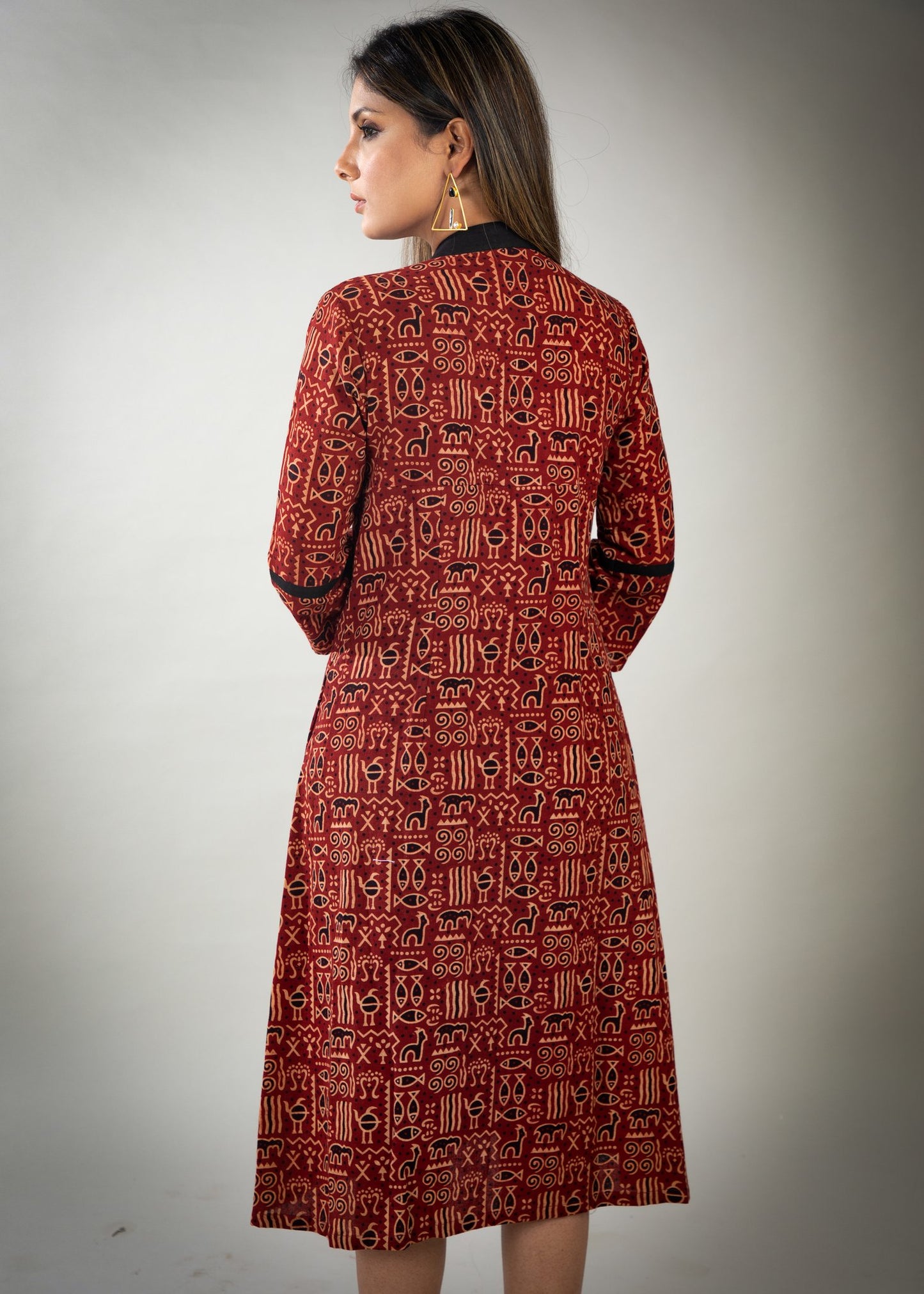 Red colour printed Ajrakh dress with black detailing & pockets