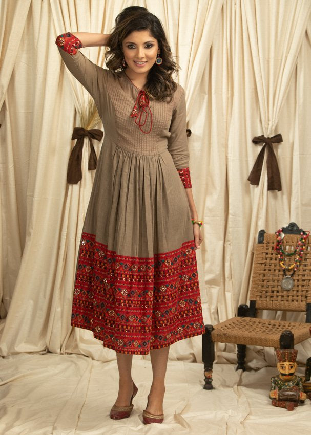 Dark beige cotton dress with pleats yok & hand embroidered embellishments on printed skirt