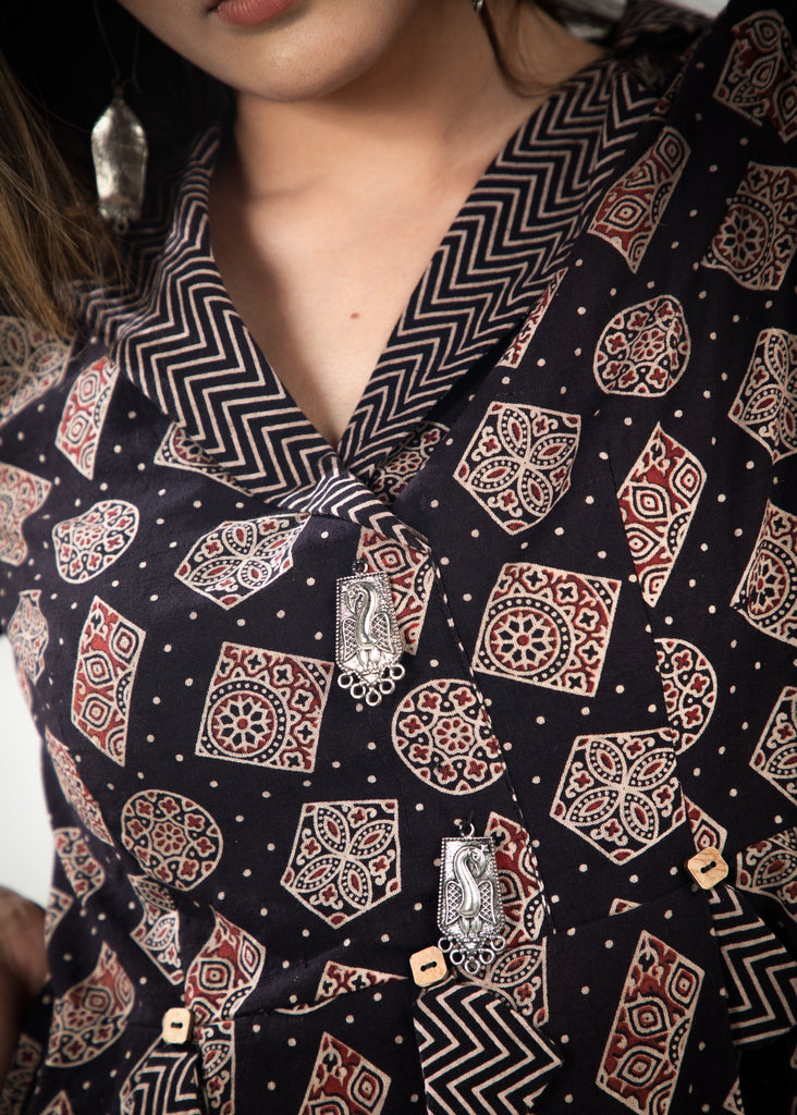 Black geometrical shape Ajrakh dress with contrast striped collar & cuffs & frills on hem