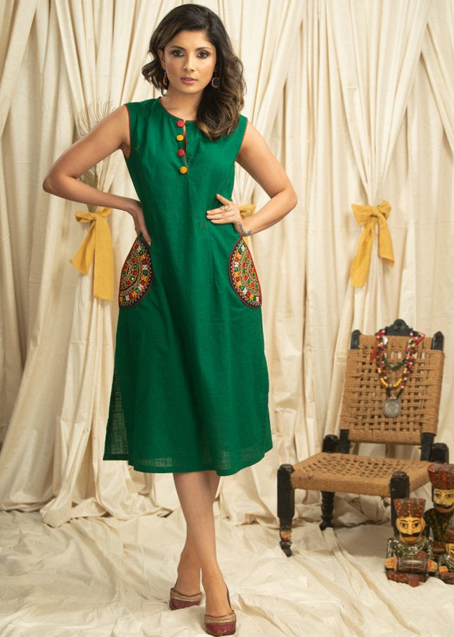 Exclusive forest green cotton dress with hand embroidered kutch mirror work pockets