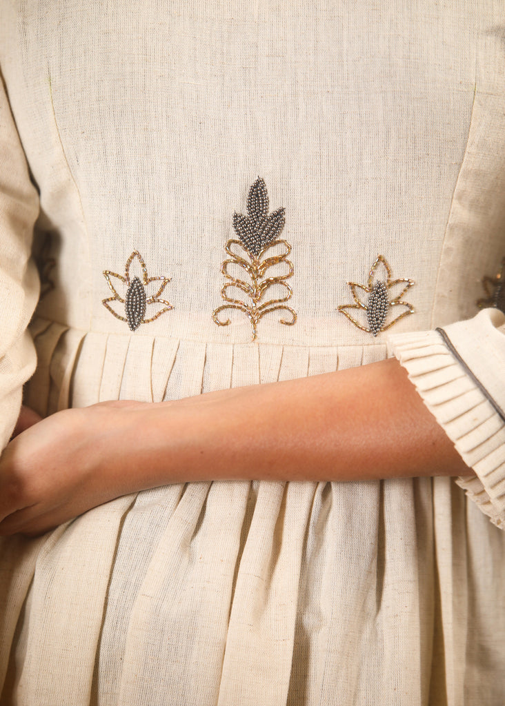 Off white flex cotton dress with hand embroidered zardosi work
