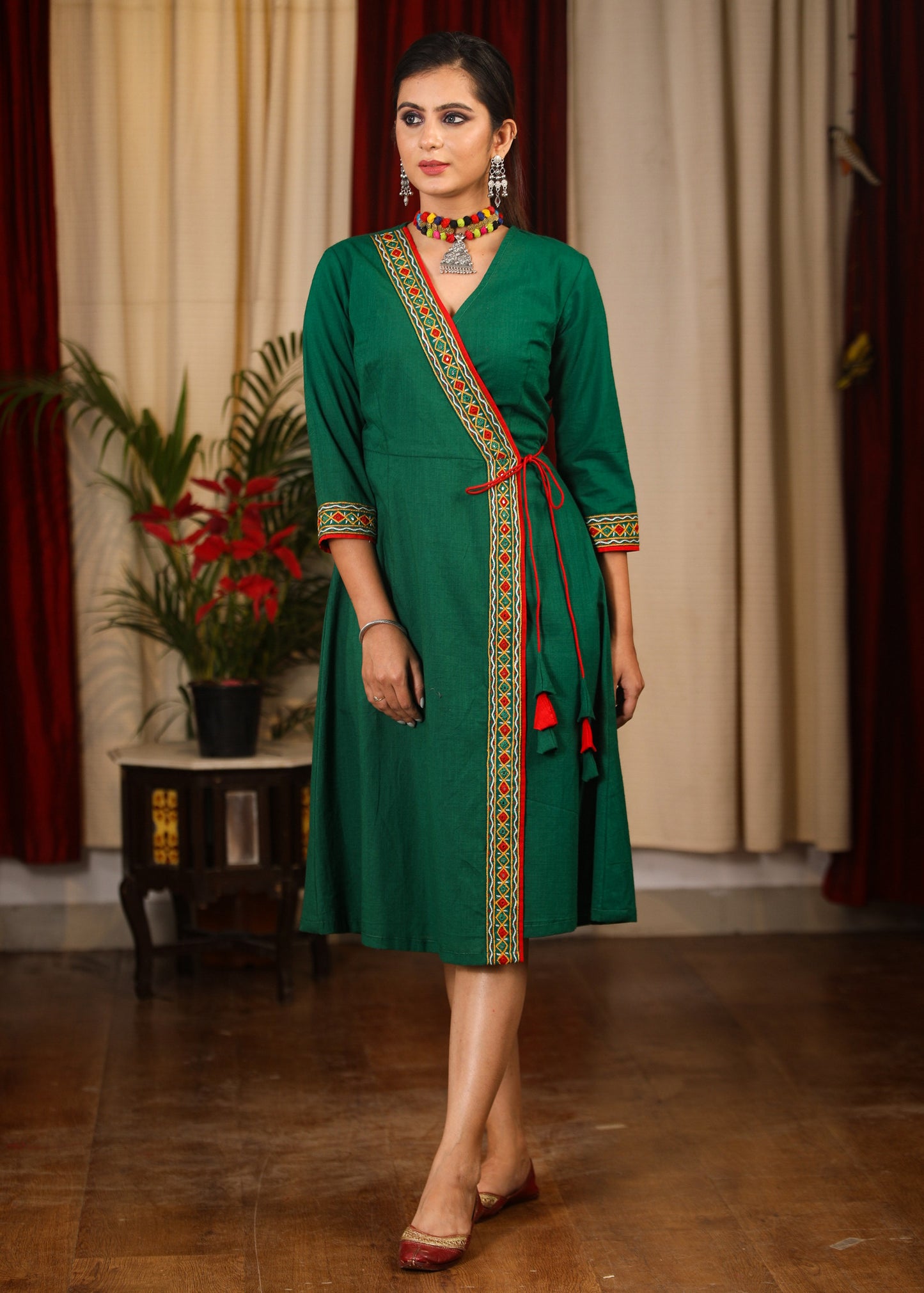 Exclusive green dress with authentic hand embroidered mirror work