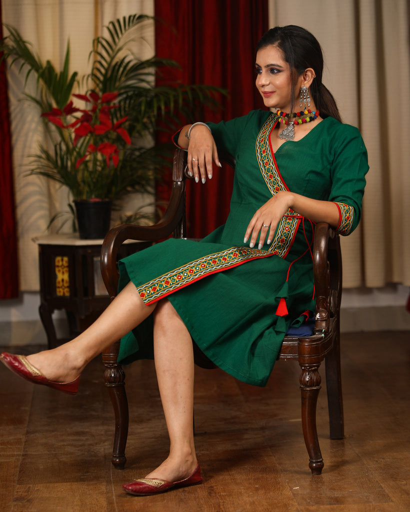 Exclusive green dress with authentic hand embroidered mirror work