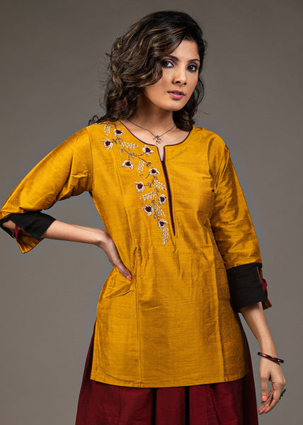 Exclusive mustard cotton top with hand embroidered zardosi embroidery