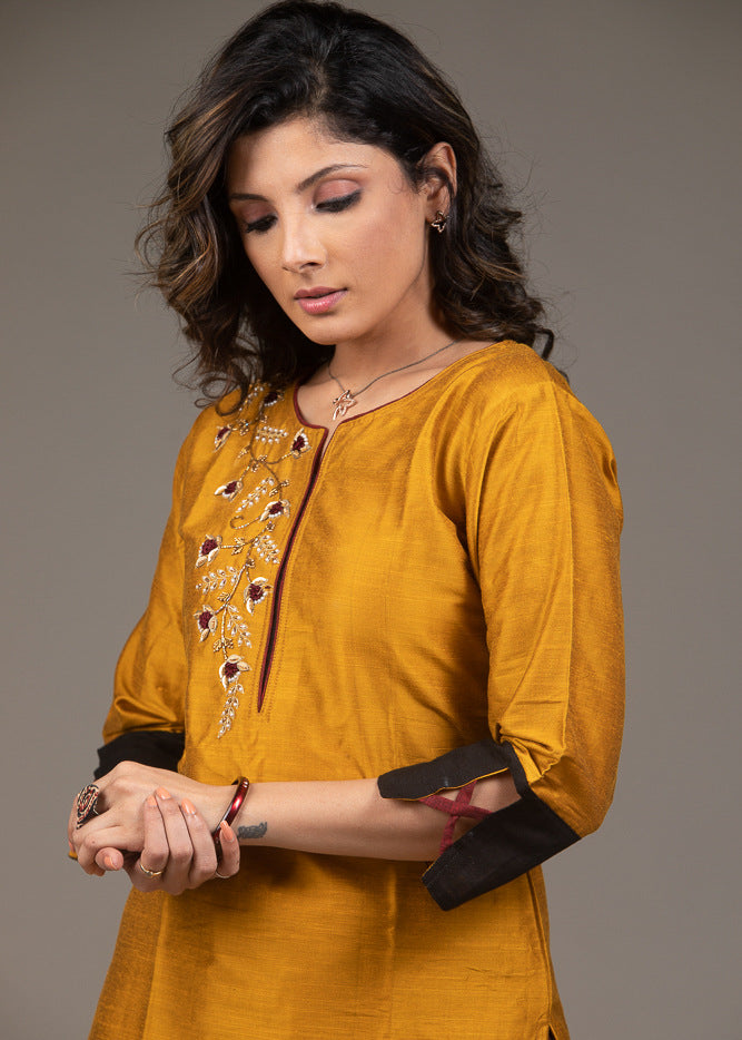 Exclusive mustard cotton top with hand embroidered zardosi embroidery