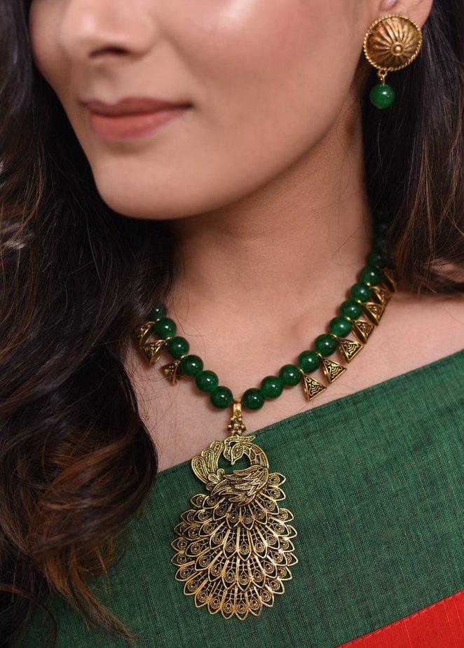 Exclusive forest green beaded necklace with Peacock pendant