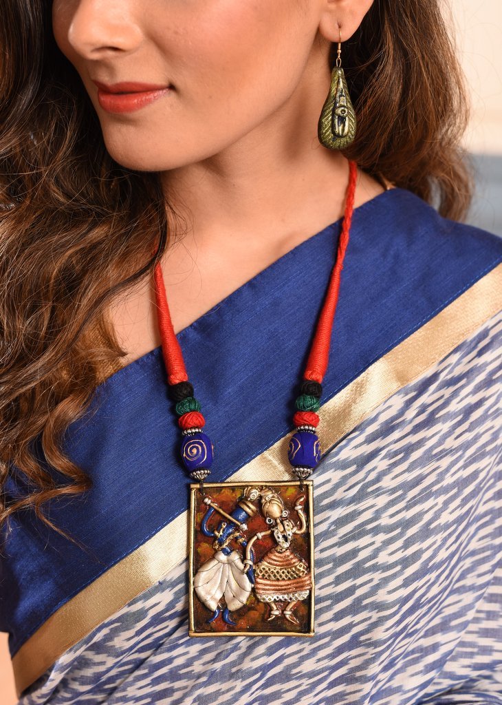 Exclusive Radha krishna pendant with peacock feather earings set