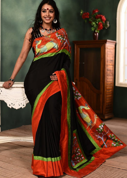 Black french crepe saree with hand painted gond tribal art border