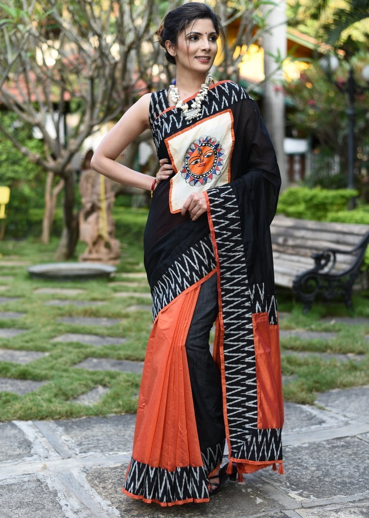 Combination of black & orange chanderi with hand painted madhubani patch & ikat border