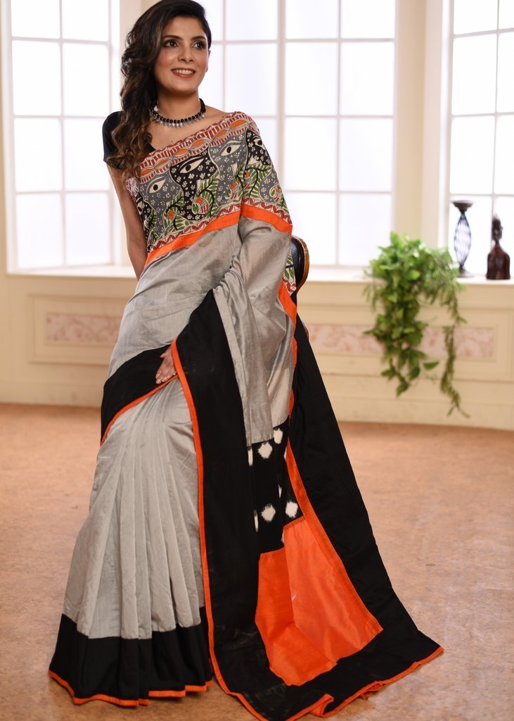 Grey chanderi saree with hand painted madhubani work in front and ikat patch on pallu