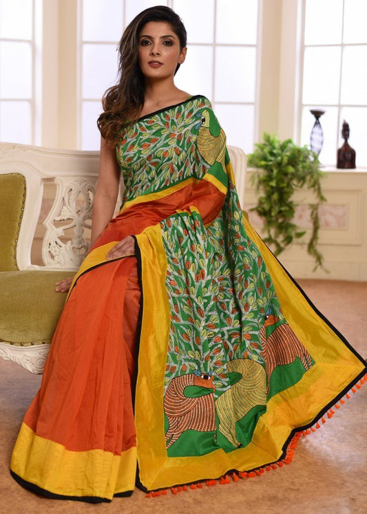 Orange chanderi saree with exclusive hand painted gond tribal art border & pallu