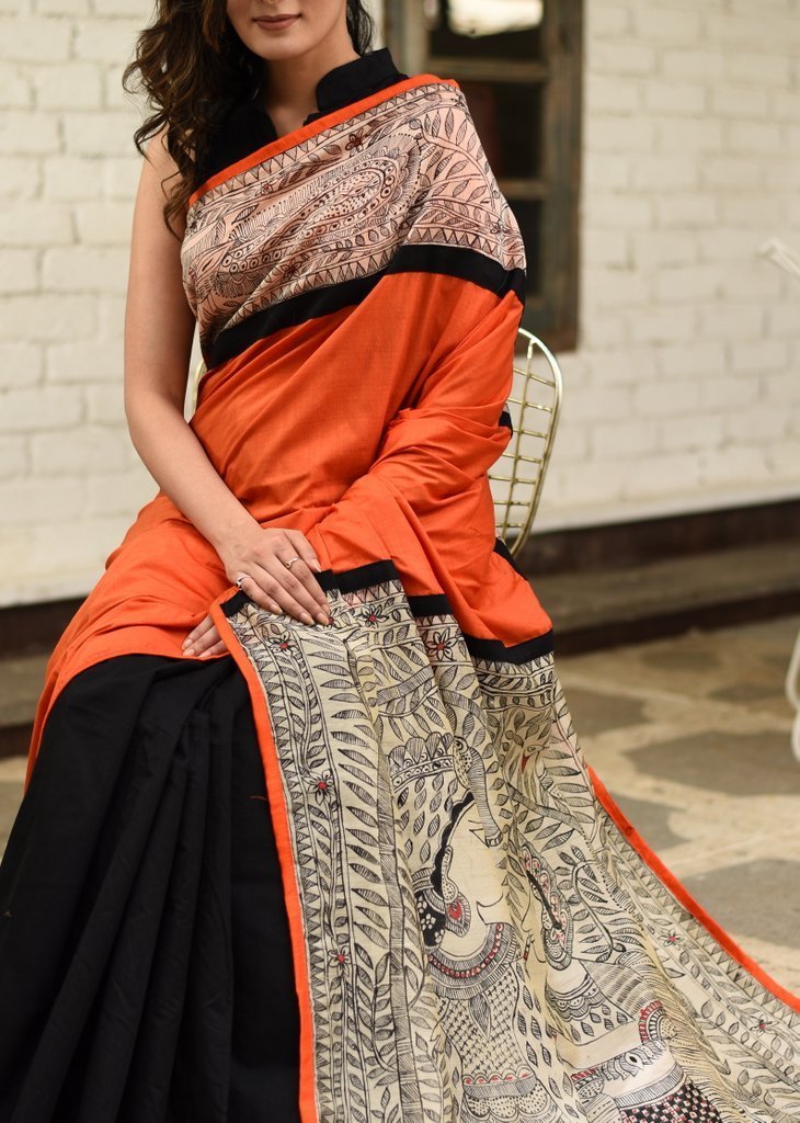 Orange semi silk with exclusive hand painted madhubani work on pallu & border with chanderi pleats